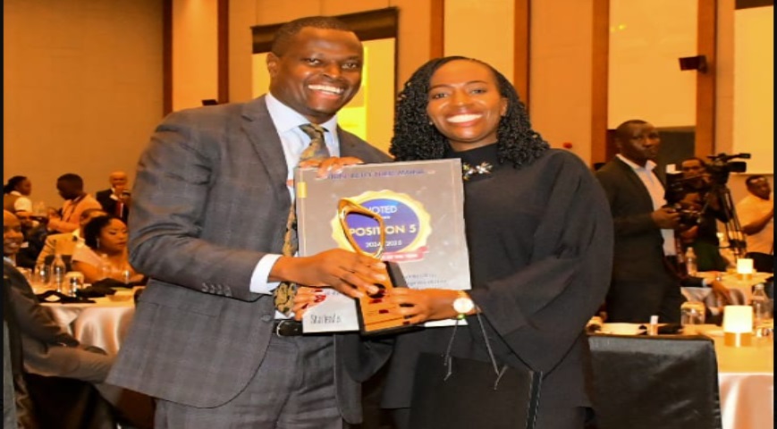 Kiharu MP Ndindi Nyoro receiving award as best MP